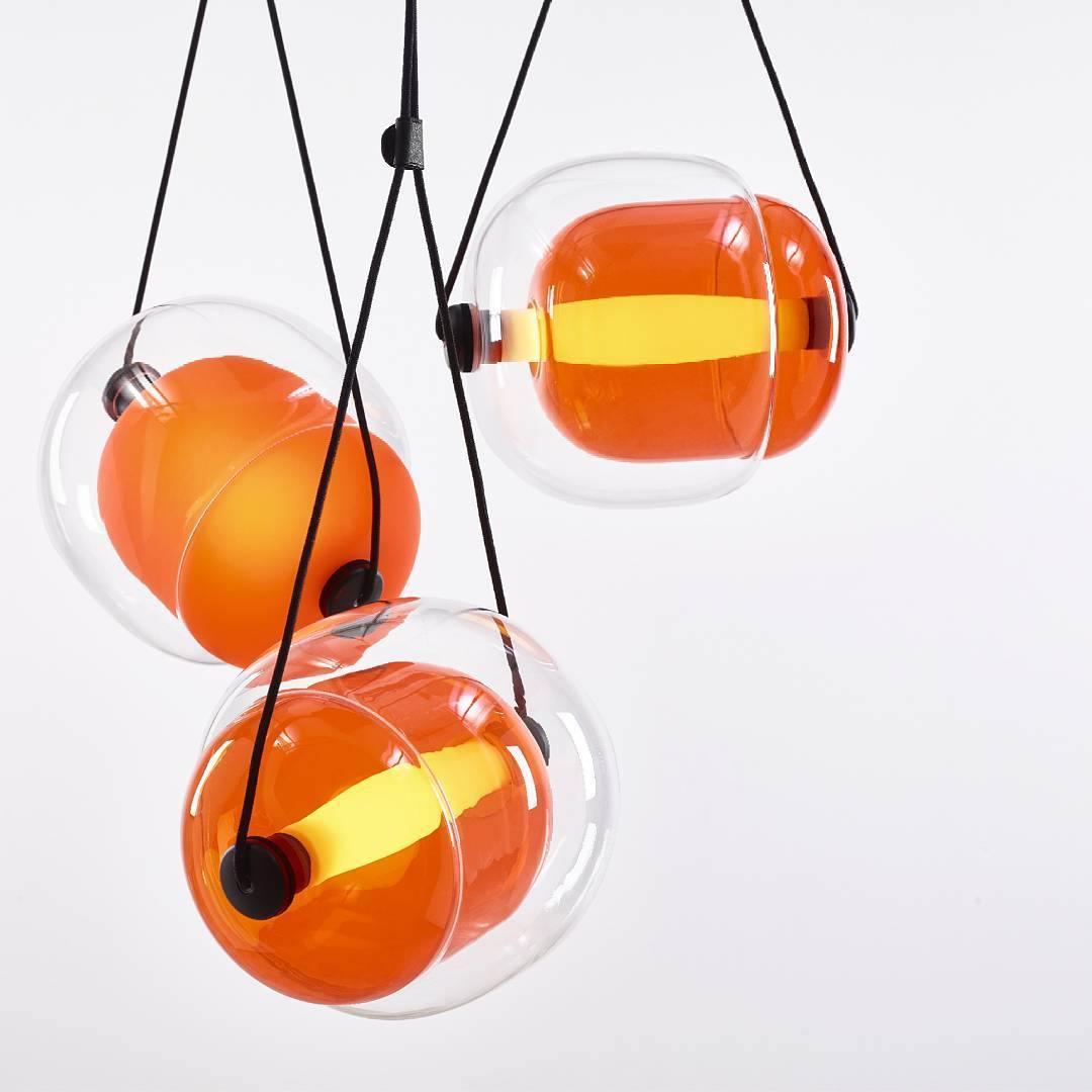 modern-capsula-layered-glass-led-pendant-light-for-contemporary-interior-lighting