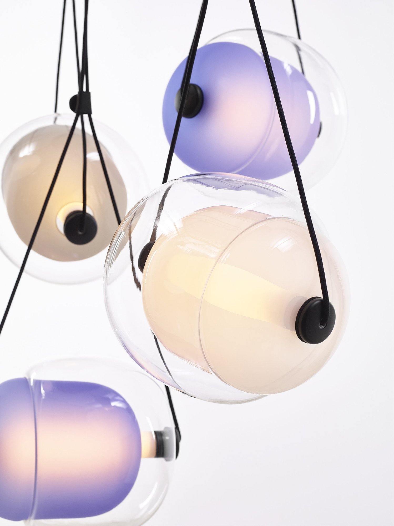 modern-capsula-layered-glass-led-pendant-light-for-contemporary-interior-lighting