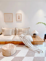 rustic-carved-ceramic-table-lamp-with-white-linen-drum-shade-and-handcrafted-earth-toned-finish