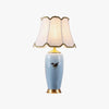 Elegant Blue Ceramic Oval Table Lamp with White Shantung Silk Shade for Modern Interiors