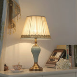 elegant-ceramic-and-brass-table-lamp-with-beige-fabric-shade-for-living-room