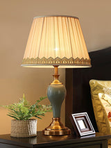 elegant-ceramic-and-brass-table-lamp-with-beige-fabric-shade-for-living-room
