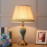 elegant-ceramic-and-brass-table-lamp-with-beige-fabric-shade-for-living-room