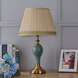 elegant-ceramic-and-brass-table-lamp-with-beige-fabric-shade-for-living-room