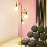 Retro Modern Memphis Style Geometric Floor Lamp with Colorful Accents and Rounded Glass Globe