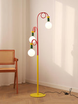 Retro Modern Memphis Style Geometric Floor Lamp with Colorful Accents and Rounded Glass Globe