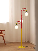 Retro Modern Memphis Style Geometric Floor Lamp with Colorful Accents and Rounded Glass Globe