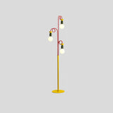 Retro Modern Memphis Style Geometric Floor Lamp with Colorful Accents and Rounded Glass Globe
