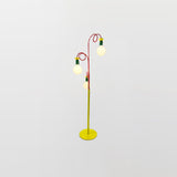 Retro Modern Memphis Style Geometric Floor Lamp with Colorful Accents and Rounded Glass Globe