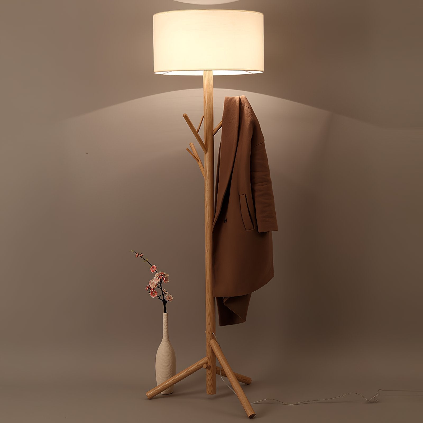 modern-ash-wood-tripod-floor-lamp-with-integrated-coat-rack-and-fabric-shade