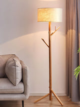 modern-ash-wood-tripod-floor-lamp-with-integrated-coat-rack-and-fabric-shade