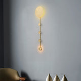 modern-brass-wall-mounted-coat-rack-sconce-with-integrated-led-lighting-for-entryways