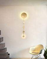 modern-brass-wall-mounted-coat-rack-sconce-with-integrated-led-lighting-for-entryways