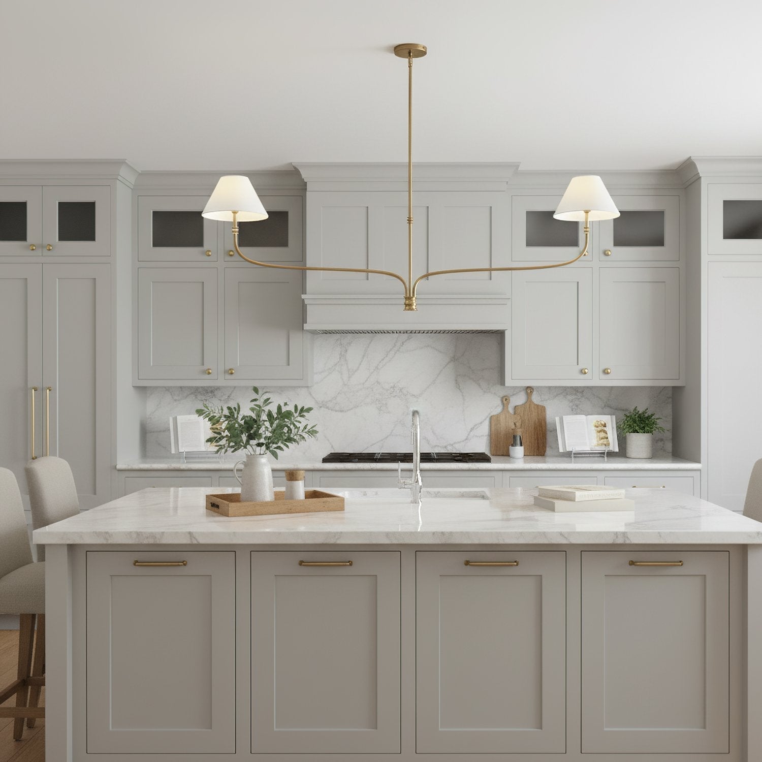 modern-antique-brass-chandelier-with-curved-arms-and-white-tapered-fabric-shades