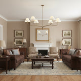 modern-antique-brass-chandelier-with-curved-arms-and-white-tapered-fabric-shades