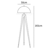 mid-century-modern-tripod-floor-lamp-with-dome-gold-metal-shade-and-black-legs