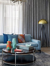 mid-century-modern-tripod-floor-lamp-with-dome-gold-metal-shade-and-black-legs