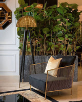 mid-century-modern-tripod-floor-lamp-with-dome-gold-metal-shade-and-black-legs