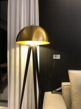 mid-century-modern-tripod-floor-lamp-with-dome-gold-metal-shade-and-black-legs