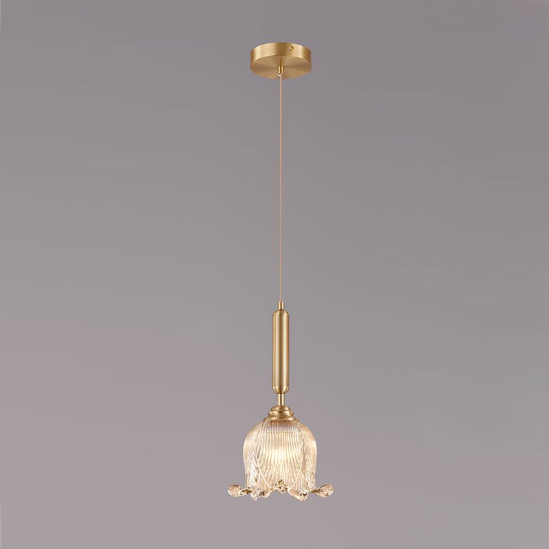 modern-brass-floral-pendant-light-with-clear-crystal-glass-shade-for-dining-areas