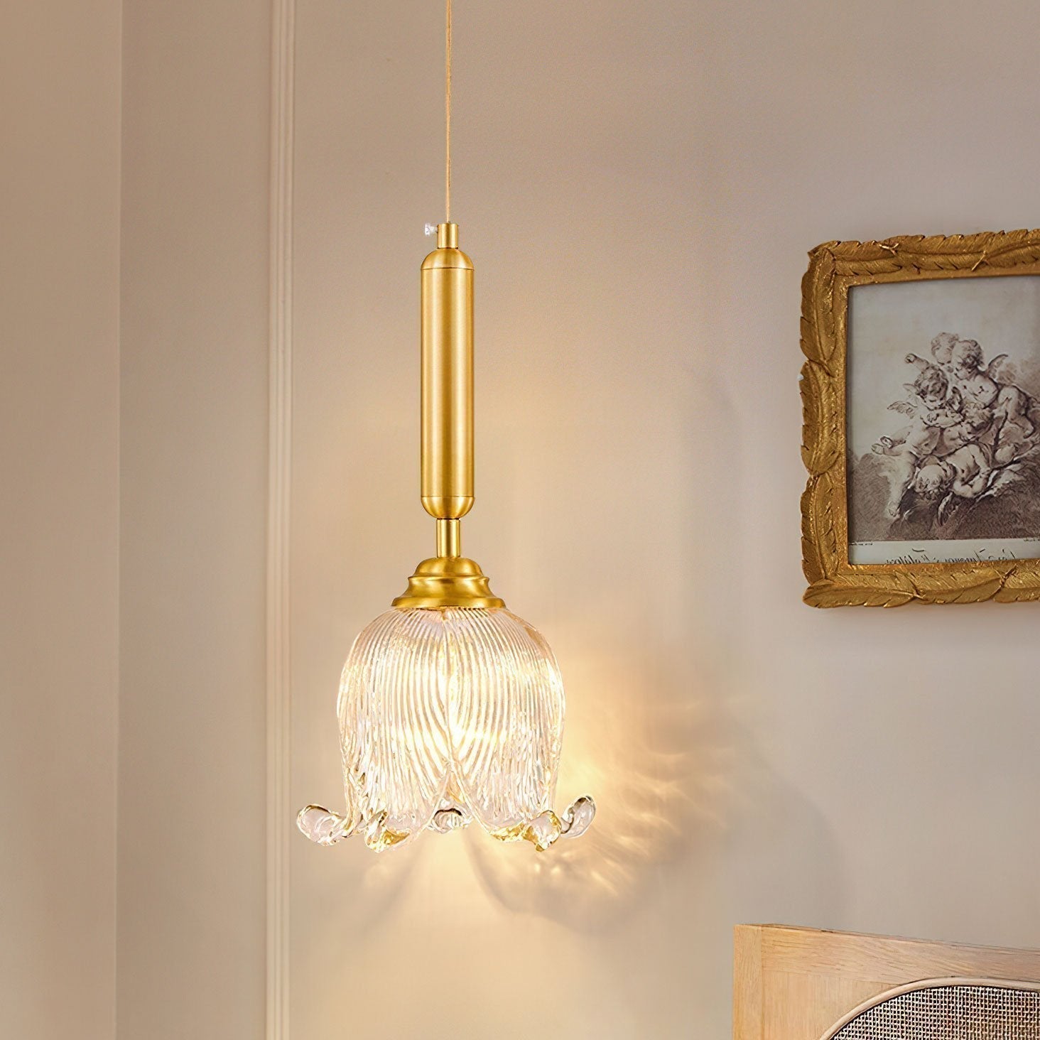 modern-brass-floral-pendant-light-with-clear-crystal-glass-shade-for-dining-areas