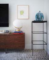 modern-asymmetrical-crescent-table-lamp-with-gold-interior-and-acrylic-globe