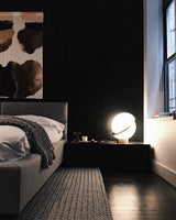 modern-asymmetrical-crescent-table-lamp-with-gold-interior-and-acrylic-globe