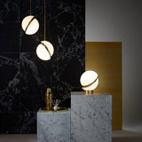 modern-asymmetrical-crescent-table-lamp-with-gold-interior-and-acrylic-globe