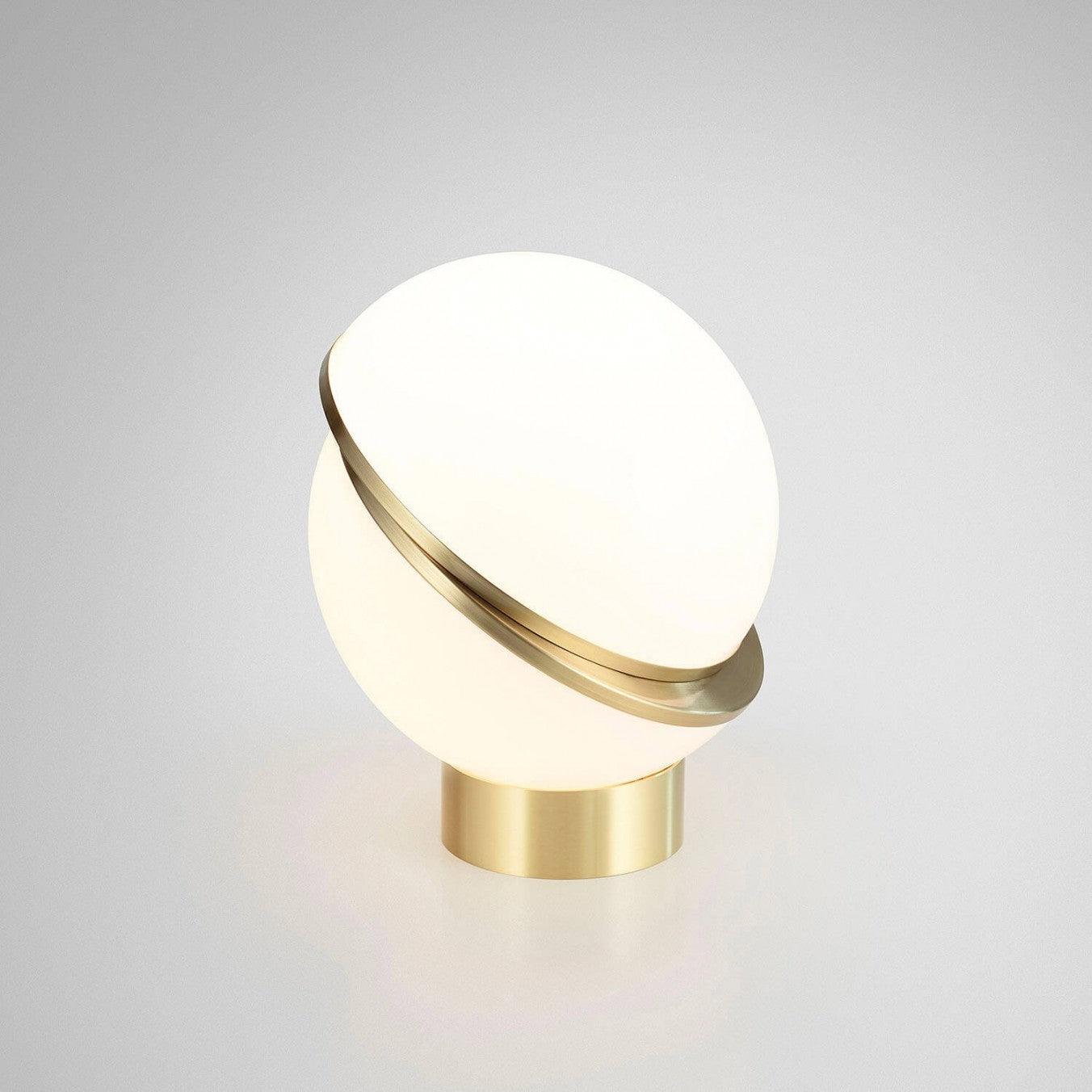 modern-asymmetrical-crescent-table-lamp-with-gold-interior-and-acrylic-globe