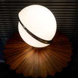 modern-asymmetrical-crescent-table-lamp-with-gold-interior-and-acrylic-globe