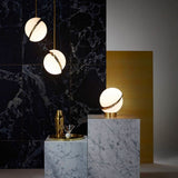 modern-asymmetrical-crescent-table-lamp-with-gold-interior-and-acrylic-globe
