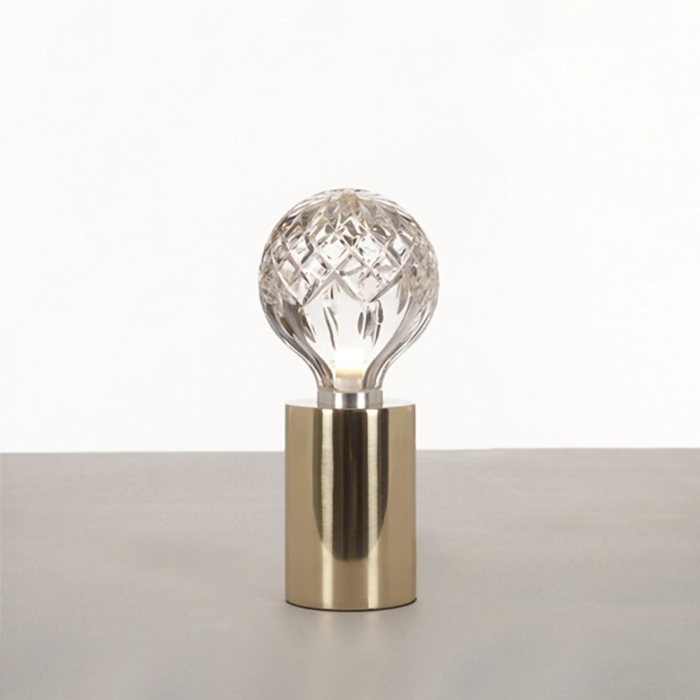modern-crystal-glass-sphere-table-lamp-with-polished-brass-base-and-warm-led-glow
