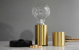 modern-crystal-glass-sphere-table-lamp-with-polished-brass-base-and-warm-led-glow
