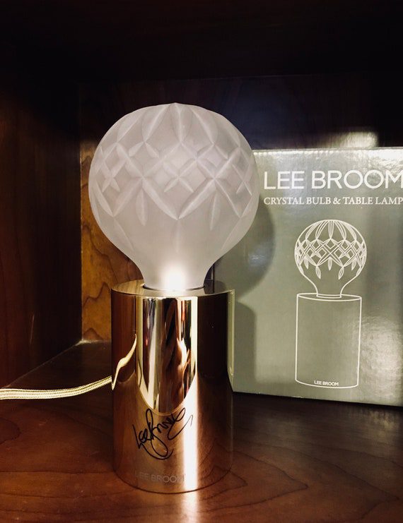 modern-crystal-glass-sphere-table-lamp-with-polished-brass-base-and-warm-led-glow