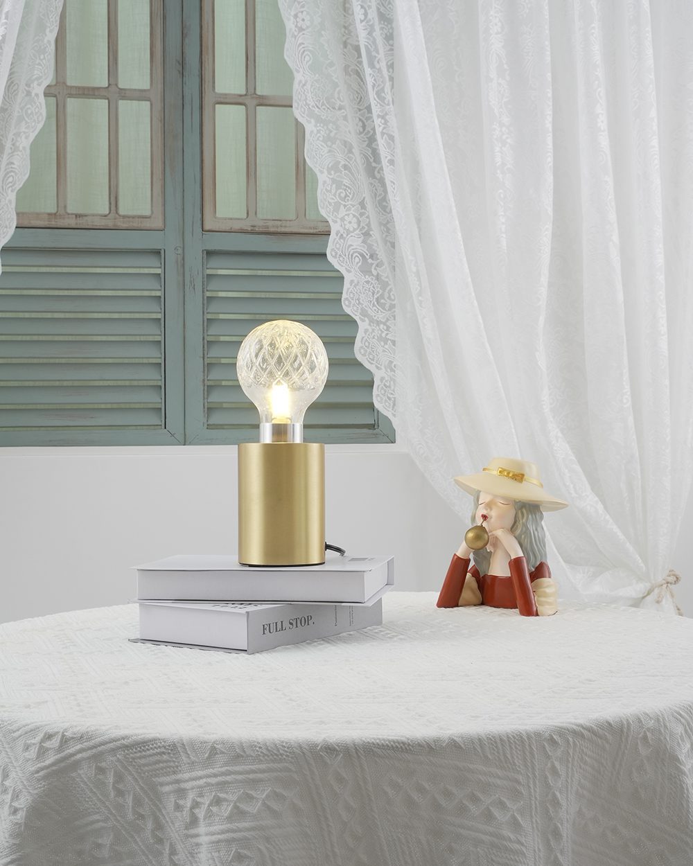modern-crystal-glass-sphere-table-lamp-with-polished-brass-base-and-warm-led-glow