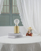 modern-crystal-glass-sphere-table-lamp-with-polished-brass-base-and-warm-led-glow