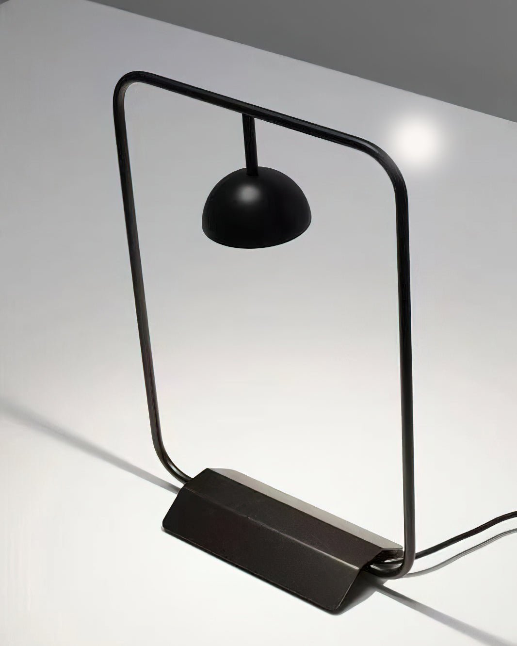 Modern Minimalist Cupolina Dome Table Lamp with Curved Metal Body for Reading and Office