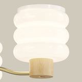 modern-glass-cylinder-chandelier-with-wood-and-metal-accents-for-dining-and-living-rooms