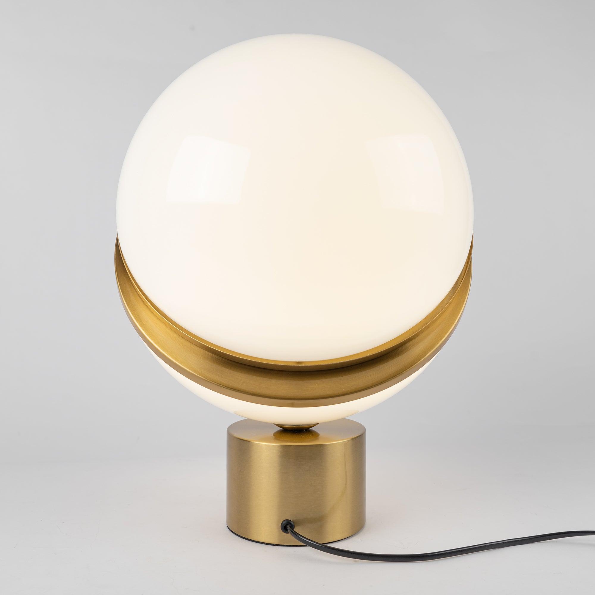modern-asymmetrical-crescent-table-lamp-with-gold-interior-and-acrylic-globe