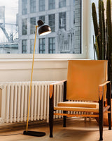modern-industrial-brass-standing-floor-lamp-with-adjustable-metal-head-and-foot-switch