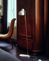 modern-industrial-brass-standing-floor-lamp-with-adjustable-metal-head-and-foot-switch