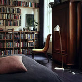 modern-industrial-brass-standing-floor-lamp-with-adjustable-metal-head-and-foot-switch