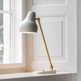 modern-adjustable-brass-arm-table-lamp-with-metal-shade-for-task-and-desk-lighting