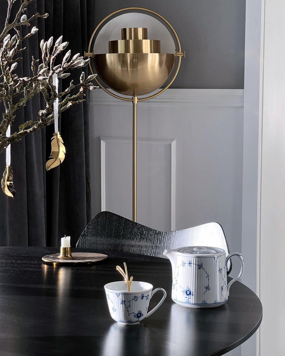 mid-century-modern-deformed-ball-floor-lamp-with-adjustable-spherical-shade