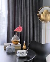 mid-century-modern-deformed-ball-floor-lamp-with-adjustable-spherical-shade