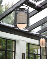 modern-industrial-black-cage-pendant-light-with-oval-fiberglass-shade-for-living-room