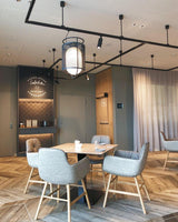 modern-industrial-black-cage-pendant-light-with-oval-fiberglass-shade-for-living-room