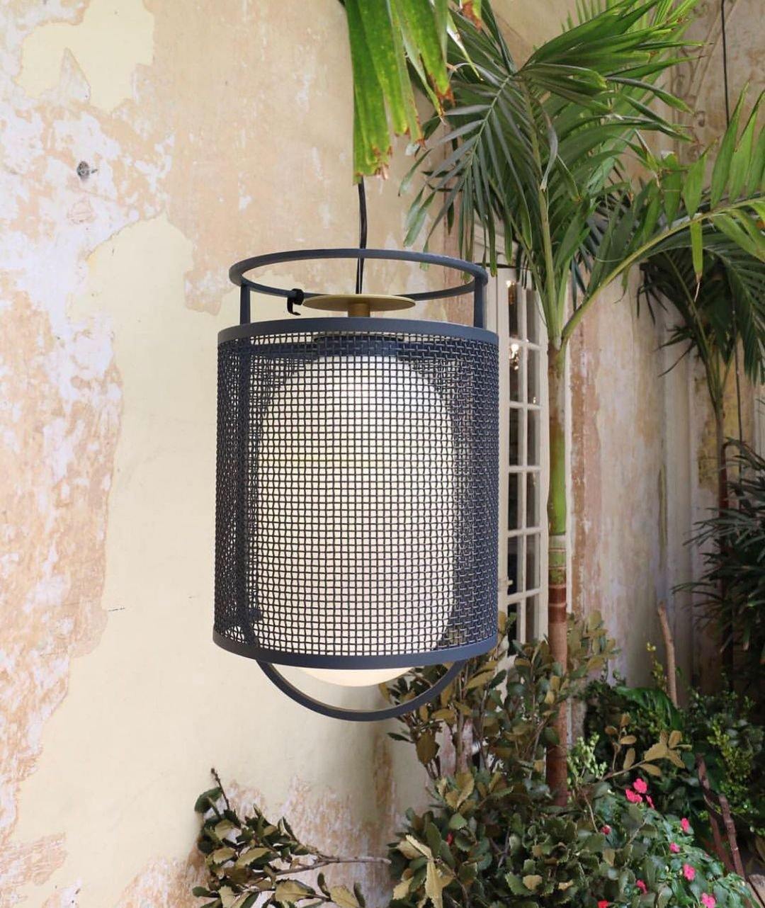 modern-industrial-black-cage-pendant-light-with-oval-fiberglass-shade-for-living-room