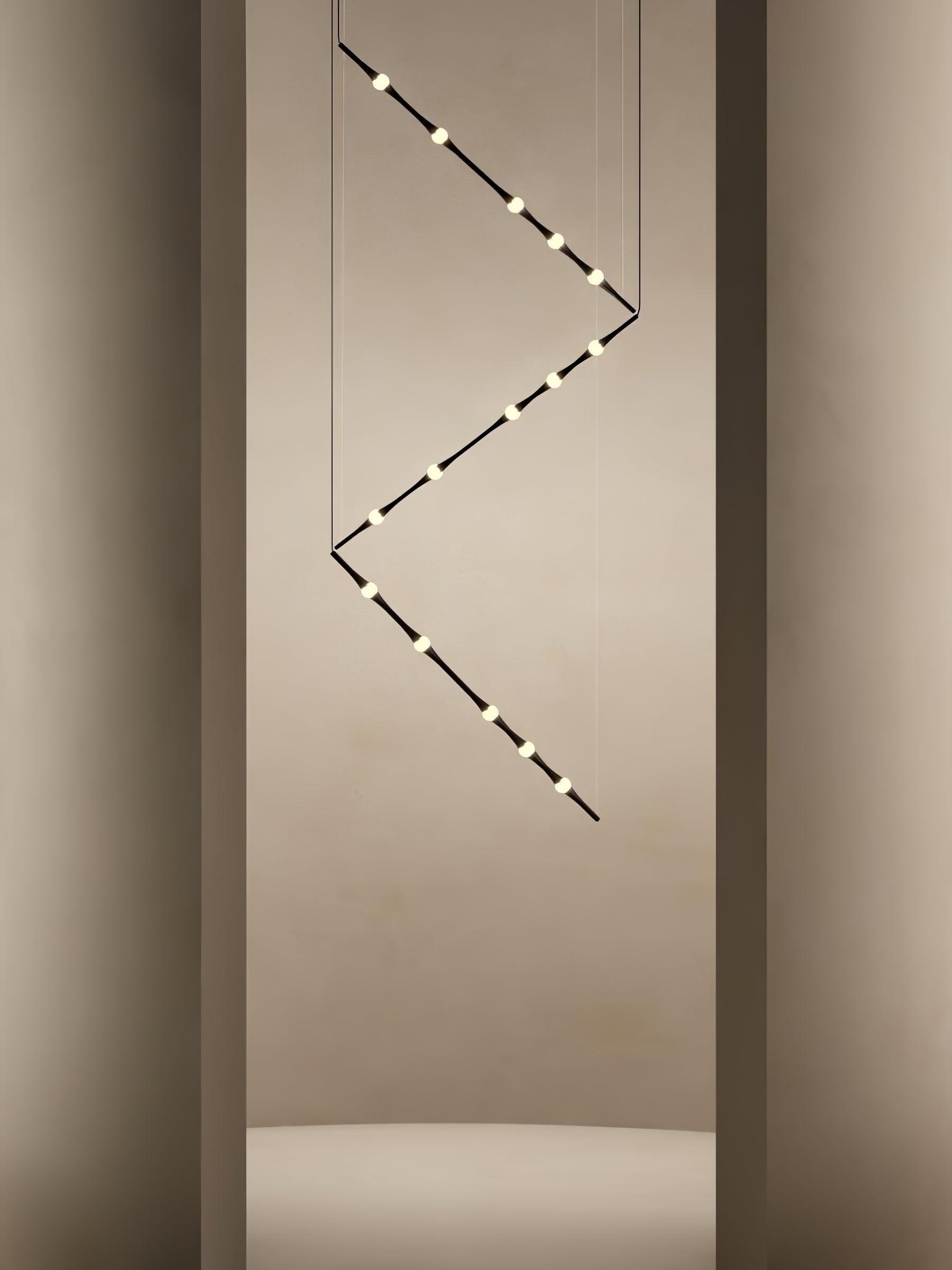 dew-explores-modern-linear-led-pendant-light-with-organic-oval-points-for-stairwells