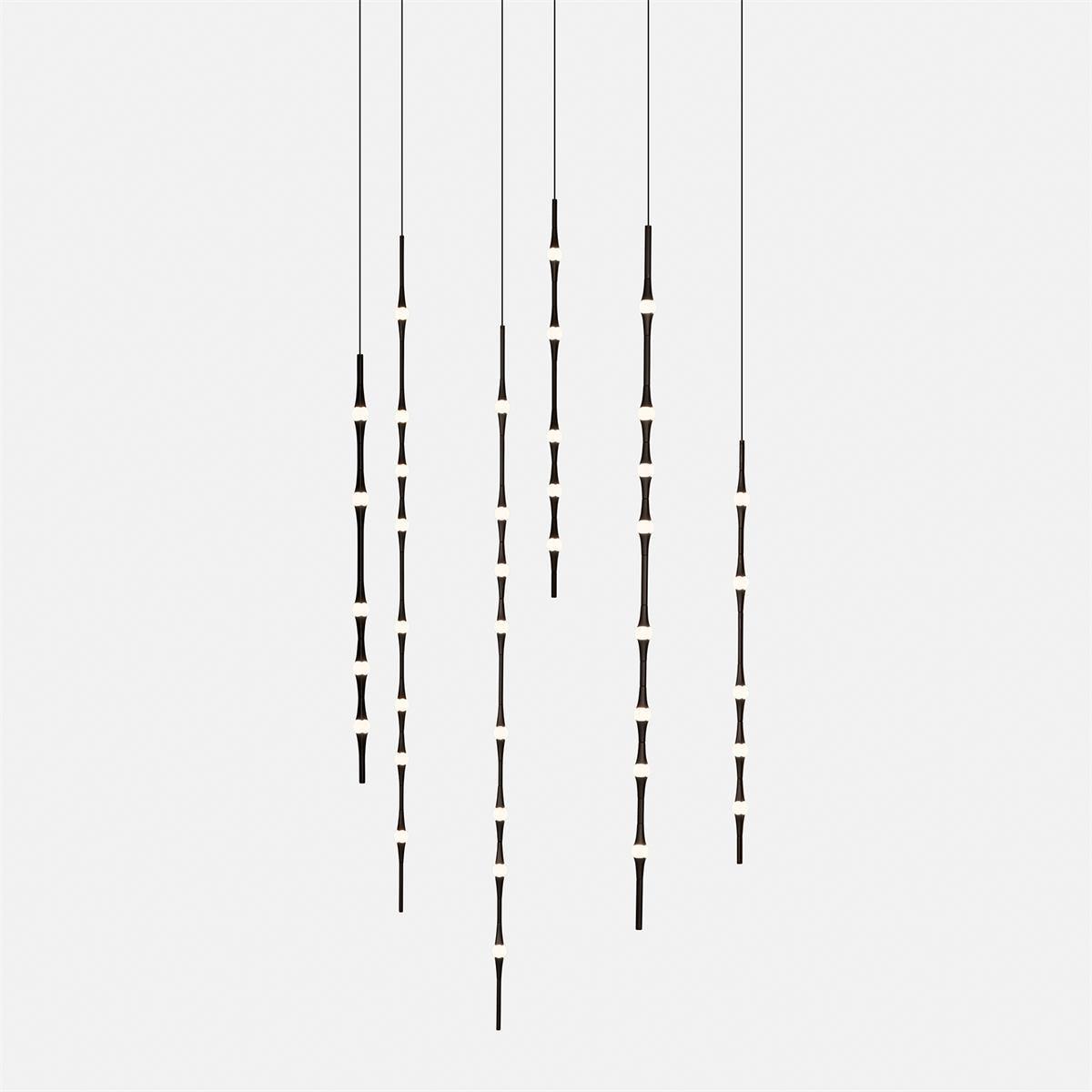 dew-explores-modern-linear-led-pendant-light-with-organic-oval-points-for-stairwells